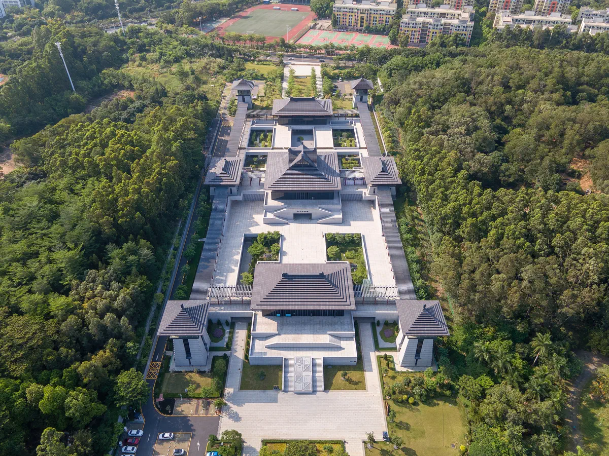 Aerial view of Southern Han Mausoleums Museum showcasing the axial courtyard layout surrounded by lush forested hills